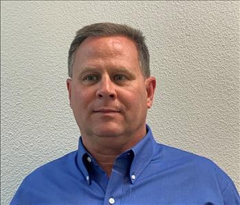 SERVPRO employee in blue shirt